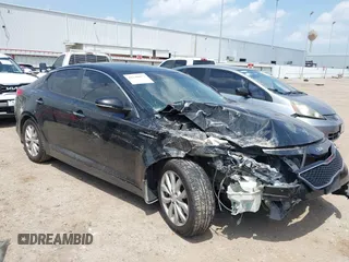 2015 Kia Optima LX z VIN 5XXGM4A73FG507178, wystawiony jako IAAI lot #42146877 z przebiegiem 165 348 mil mil oraz . Historia ofert i sprzedaży dostępna na DreamBid. Obrazek 1.
