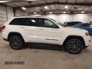 2017 Jeep Grand Cherokee Trailhawk with VIN 1C4RJFLG7HC712208, listed as a IAAI auction lot 42174543 with 158,518 mi miles and . Bid and sale history available at DreamBid. Image 13.