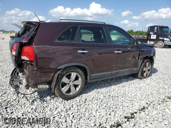 2012 Kia Sorento EX с VIN 5XYKU3A69CG248327, выставлен на аукционе Copart как лот 52068555 с пробегом 197 536 миль миль и Списание • Salvage title. История ставок и продаж доступна на DreamBid. Изображение 3.