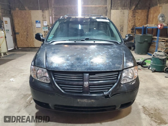 2005 Dodge Caravan SE z VIN 1D4GP24R45B245977, wystawiony jako Copart lot #58262555 z przebiegiem 254 176 mil mil oraz Czysty tytuł • Clean title. Historia ofert i sprzedaży dostępna na DreamBid. Obrazek 5.