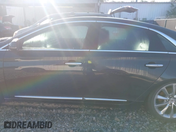 2013 Cadillac XTS Luxury with VIN 2G61P5S3XD9141306, listed as a IAAI auction lot 42034077 with 120,294 mi miles. Bid and sale history available at carsss.com. Image 14.