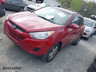 2012 Hyundai Tucson Limited with VIN KM8JU3ACXCU345113, listed as a IAAI auction lot 41946239 with 173,007 mi miles. Bid and sale history available at carsss.com. Image 2.