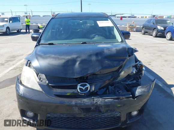 2006 Mazda 5 Sport with VIN JM1CR29L560126780, listed as a IAAI auction lot 41653391 with 112,547 mi miles and . Bid and sale history available at DreamBid. Image 12.