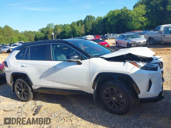 2023 Toyota RAV4 Hybrid XSE with VIN 2T3E6RFV1PW038080, listed as a IAAI auction lot 42518107 with 14,430 mi miles and . Bid and sale history available at DreamBid. Image 13.