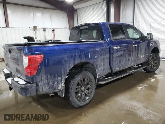 2017 Nissan Titan XD SL with VIN 1N6AA1F40HN515951, listed as a Copart auction lot 87587115 with 79,970 mi miles and Salvage Title. Bid and sale history available at carsss.com. Image 3.