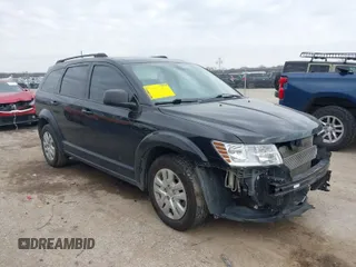 2019 Dodge Journey SE Value with VIN 3C4PDCAB8KT867916, listed as a IAAI auction lot 41549040 with 124,411 mi miles and . Bid and sale history available at DreamBid. Image 1.