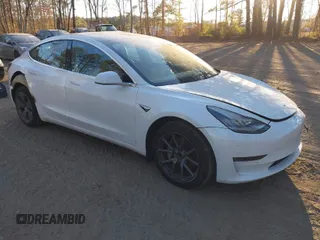 2020 Tesla Model 3 Standard Range Plus with VIN 5YJ3E1EA6LF709009, listed as a IAAI auction lot 40986966 with 116,495 mi miles. Bid and sale history available at carsss.com. Image 1.