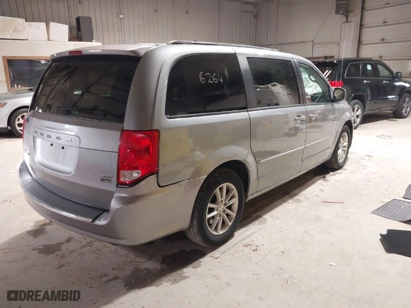 2014 Dodge Grand Caravan SXT with VIN 2C4RDGCGXER263963, listed as a IAAI auction lot 41956264 with 138,815 mi miles. Bid and sale history available at carsss.com. Image 4.