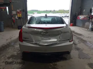 2016 Cadillac ATS Standard AWD z VIN 1G6AG5RX6G0149829, wystawiony jako IAAI lot #42165534 z przebiegiem 40 996 mil mil oraz . Historia ofert i sprzedaży dostępna na DreamBid. Obrazek 16.