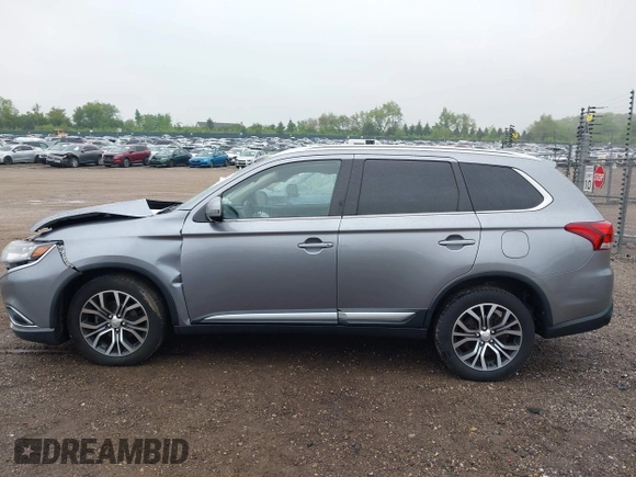 2018 Mitsubishi Outlander SE z VIN JA4AD3A35JZ064058, wystawiony jako IAAI lot #42311265 z przebiegiem 79 291 mil mil oraz . Historia ofert i sprzedaży dostępna na DreamBid. Obrazek 14.