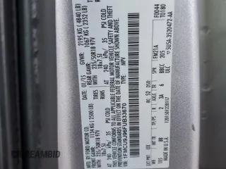 2015 Ford Escape Titanium with VIN 1FMCU9J96FUB33670, listed as a Copart auction lot 61826915 with 179,794 mi miles and Salvage title. Bid and sale history available at DreamBid. Image 13.