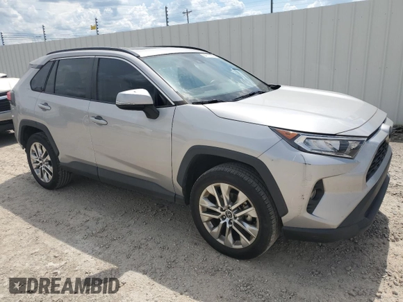 2021 Toyota RAV4 XLE Premium z VIN 2T3C1RFV9MW104408, wystawiony jako Copart lot #64117035 z przebiegiem 54 946 mil mil oraz Szkoda całkowita • Salvage title. Historia ofert i sprzedaży dostępna na DreamBid. Obrazek 4.