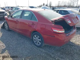 2011 Toyota Camry LE with VIN 4T4BF3EKXBR206023, listed as a IAAI auction lot 41779252 with 129,708 mi miles. Bid and sale history available at carsss.com. Image 3.
