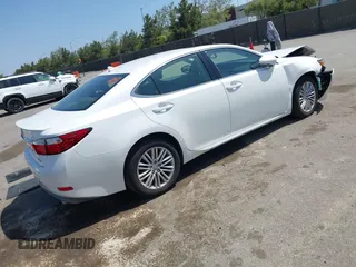 2014 Lexus ES 330 z VIN JTHBK1GG6E2113795, wystawiony jako IAAI lot #42207580 z przebiegiem 128 540 mil mil oraz . Historia ofert i sprzedaży dostępna na DreamBid. Obrazek 4.