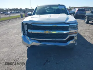 2018 Chevrolet Silverado 1500 LT with VIN 1GCRCREC1JZ153165, listed as a IAAI auction lot 41737258 with 130,475 mi miles and . Bid and sale history available at DreamBid. Image 6.