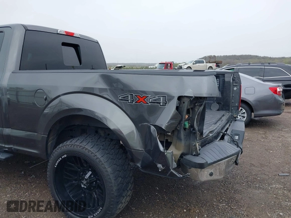 2015 Ford F-150 XLT with VIN 1FTEX1EP9FFC75210, listed as a IAAI auction lot 39041797 with 125,522 mi miles. Bid and sale history available at carsss.com. Image 6.
