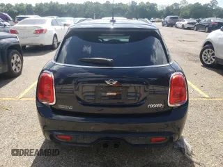 2016 MINI Hardtop 4 Door S with VIN WMWXU3C58G2B67264, listed as a Copart auction lot 61454215 with 66,550 mi miles and Salvage title. Bid and sale history available at DreamBid. Image 6.