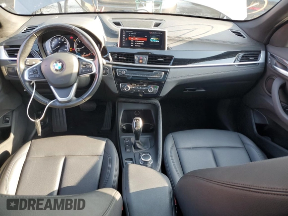2021 BMW X1 xDrive28i with VIN WBXJG9C09M5T96327, listed as a Copart auction lot 49876493 with 42,572 mi miles and . Bid and sale history available at DreamBid. Image 8.