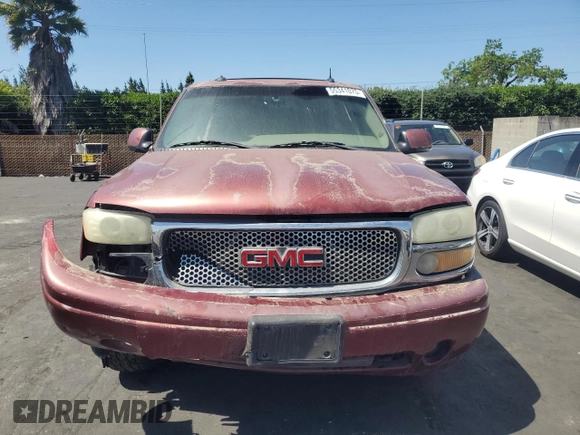 2003 GMC Yukon Denali z VIN 1GKEK63U93J307591, wystawiony jako Copart lot #55341075 z przebiegiem 201 493 mil mil oraz Szkoda całkowita • Salvage title. Historia ofert i sprzedaży dostępna na DreamBid. Obrazek 5.