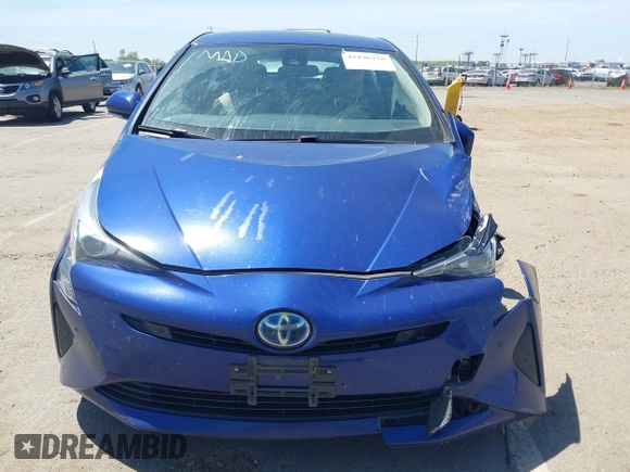 2017 Toyota Prius Two with VIN JTDKBRFUXH3044163, listed as a IAAI auction lot 42196278 with 117,610 mi miles and . Bid and sale history available at DreamBid. Image 12.