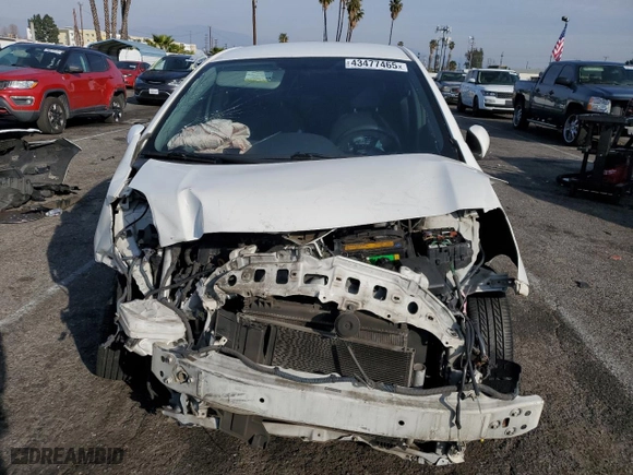 2010 Toyota Yaris with VIN JTDKT4K36A5323097, listed as a Copart auction lot 43477465 with 145,556 mi miles and Salvage Title. Bid and sale history available at carsss.com. Image 5.