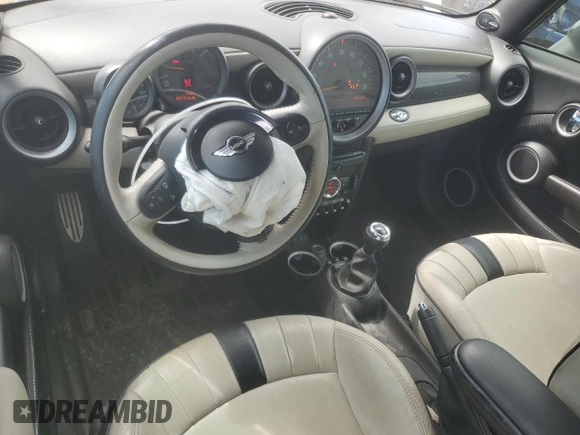 2015 MINI Convertible S z VIN WMWZP3C52FT298857, wystawiony jako Copart lot #58149145 z przebiegiem 52 777 mil mil oraz Szkoda całkowita • Salvage title. Historia ofert i sprzedaży dostępna na DreamBid. Obrazek 8.