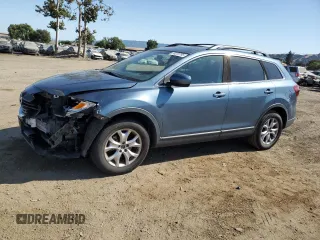 2015 Mazda CX-9 Touring with VIN JM3TB2CV1F0469009, listed as a Copart auction lot 59225785 with 93,330 mi miles and Salvage title. Bid and sale history available at DreamBid. Image 1.