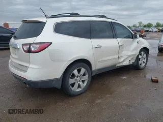 2014 Chevrolet Traverse LTZ with VIN 1GNKRJKD9EJ168099, listed as a IAAI auction lot 41955937 with 171,371 mi miles and . Bid and sale history available at DreamBid. Image 4.