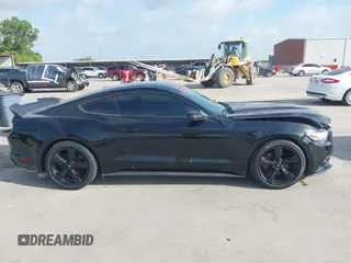 2015 Ford Mustang EcoBoost with VIN 1FA6P8TH3F5418205, listed as a IAAI auction lot 42552784 with 124,782 mi miles and . Bid and sale history available at DreamBid. Image 13.