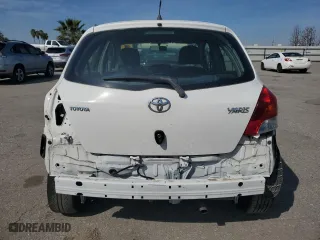 2009 Toyota Yaris with VIN JTDKT903495224256, listed as a Copart auction lot 50065565 with 164,473 mi miles and Salvage Title. Bid and sale history available at carsss.com. Image 6.