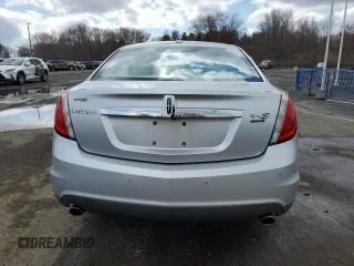 2010 Lincoln MKS EcoBoost with VIN 1LNHL9FT0AG606161, listed as a Copart auction lot 51686965 with 143,188 mi miles and Salvage Title. Bid and sale history available at DreamBid. Image 6.