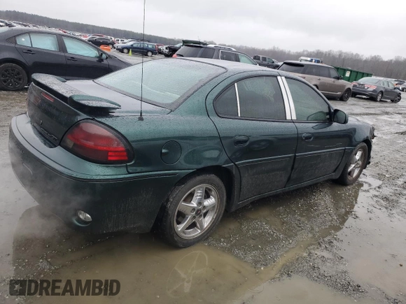 2001 Pontiac Grand Am GT with VIN 1G2NW52E81C266753, listed as a Copart auction lot 45086335 with 181,742 mi miles and Salvage Title. Bid and sale history available at carsss.com. Image 3.