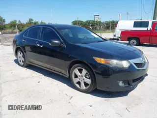 2010 Acura TSX with VIN JH4CU2F63AC040712, listed as a IAAI auction lot 42018157 with 159,730 mi miles. Bid and sale history available at carsss.com. Image 1.