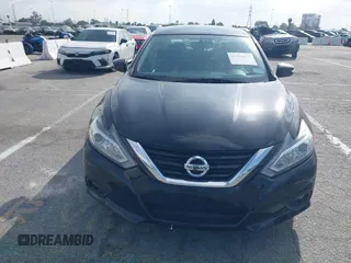 2018 Nissan Altima SR with VIN 1N4AL3AP7JC279459, listed as a IAAI auction lot 41901831 with 104,798 mi miles and . Bid and sale history available at DreamBid. Image 12.
