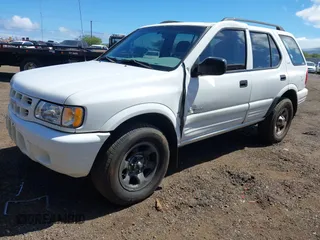 2000 Isuzu Rodeo S with VIN 4S2CK58W6Y4355597, listed as a IAAI auction lot 41775764 with 122,776 mi miles. Bid and sale history available at carsss.com. Image 17.
