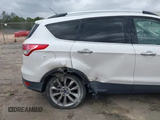 2016 Ford Escape SE with VIN 1FMCU0GX0GUA95789, listed as a IAAI auction lot 41829818 with 84,431 mi miles. Bid and sale history available at carsss.com. Image 6.