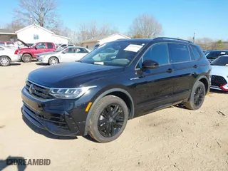 2022 Volkswagen Tiguan SE R-Line Black with VIN 3VVCB7AX1NM084993, listed as a IAAI auction lot 41502738 with 56,559 mi miles. Bid and sale history available at carsss.com. Image 2.