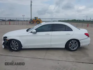 2018 Mercedes-Benz C 300 with VIN 55SWF4JB0JU252994, listed as a IAAI auction lot 42113897 with 72,533 mi miles and . Bid and sale history available at DreamBid. Image 14.