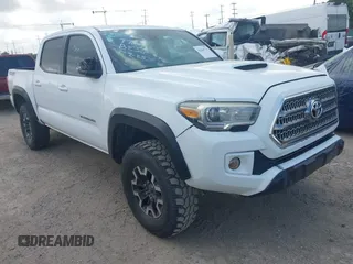 2018 Toyota Tacoma SR with VIN 3TMCZ5AN6JM138747, listed as a IAAI auction lot 42684725 with 144,725 mi miles and . Bid and sale history available at DreamBid. Image 1.