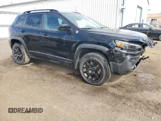 2022 Jeep Cherokee Trailhawk with VIN 1C4PJMBX3ND555098, listed as a Copart auction lot 58559374 with 0 mi miles and Salvage Title. Bid and sale history available at carsss.com. Image 4.