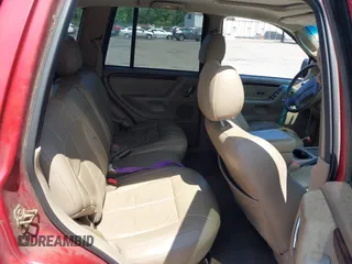 2004 Jeep Grand Cherokee Limited with VIN 1J4GX58N34C401838, listed as a IAAI auction lot 42714681 with 205,477 mi miles and . Bid and sale history available at DreamBid. Image 8.