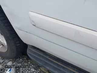 2007 Chevrolet Tahoe LT with VIN 1GNFC13007R415013, listed as a IAAI auction lot 42370633 with 302,992 mi miles and . Bid and sale history available at DreamBid. Image 6.