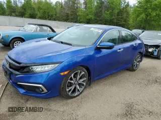2020 Honda Civic Touring z VIN 2HGFC1F99LH103089, wystawiony jako Copart lot #58692905 z przebiegiem 105 848 mil mil oraz Czysty tytuł • Clean title. Historia ofert i sprzedaży dostępna na DreamBid. Obrazek 1.