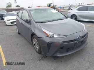 2022 Toyota Prius L Eco z VIN JTDKAMFU2N3181566, wystawiony jako IAAI lot #42181302 z przebiegiem 173 332 mil mil oraz . Historia ofert i sprzedaży dostępna na DreamBid. Obrazek 1.