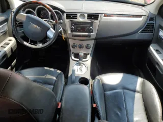 2010 Chrysler Sebring Limited with VIN 1C3CC5FD1AN197099, listed as a Copart auction lot 59128825 with 85,736 mi miles and Salvage title. Bid and sale history available at DreamBid. Image 8.