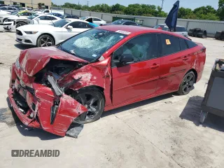 2021 Toyota Prius L Eco z VIN JTDKAMFU4M3130018, wystawiony jako Copart lot #56886245 z przebiegiem 37 867 mil mil oraz Szkoda całkowita • Salvage title. Historia ofert i sprzedaży dostępna na DreamBid. Obrazek 1.