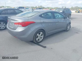 2013 Hyundai Elantra GLS PZEV with VIN KMHDH4AE9DU680860, listed as a IAAI auction lot 41068349 with 74,687 mi miles. Bid and sale history available at carsss.com. Image 4.