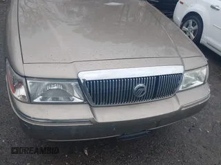 2004 Mercury Grand Marquis GS with VIN 2MEFM74W24X604421, listed as a IAAI auction lot 41929099 with 200,500 mi miles and . Bid and sale history available at DreamBid. Image 6.