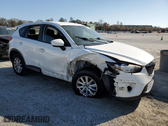 2013 Mazda CX-5 Sport z VIN JM3KE4BEXD0158031, wystawiony jako Copart lot #77827644 z przebiegiem Nie podano mil oraz Szkoda całkowita • Salvage title. Historia ofert i sprzedaży dostępna na DreamBid. Obrazek 4.