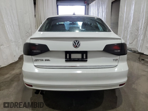 2017 Volkswagen Jetta SEL with VIN 3VWL17AJ3HM410145, listed as a Copart auction lot 58792565 with 186,732 mi miles and Salvage title. Bid and sale history available at DreamBid. Image 6.